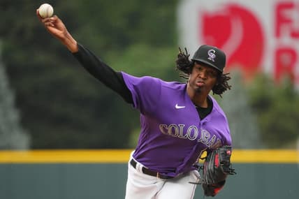 Sep 22, 2022; Denver, Colorado, USA; Colorado Rockies starting pitcher Jose Urena (51) pitches in the first inning against the San Francisco Giants at Coors Field. Mandatory Credit: Ron Chenoy-USA TODAY Sports