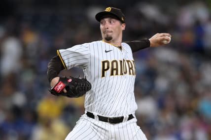 Sep 27, 2022; San Diego, California, USA; San Diego Padres starting pitcher Blake Snell (4) throws a pitch against the Los Angeles Dodgers during the first inning at Petco Park. Mandatory Credit: Orlando Ramirez-USA TODAY Sports