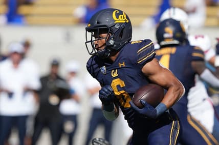 Sep 24, 2022; Berkeley, California, USA; California Golden Bears running back Jaydn Ott (6) carries the ball against the Arizona Wildcats during the first quarter at FTX Field at California Memorial Stadium. Mandatory Credit: Darren Yamashita-USA TODAY Sports