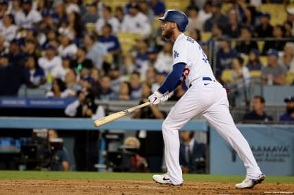 Sep 30, 2022; Los Angeles, California, USA;  Los Angeles Dodgers center fielder Cody Bellinger (35) hits a 3-run home run during the fourth inning against the Colorado Rockies at Dodger Stadium. Mandatory Credit: Kiyoshi Mio-USA TODAY Sports
