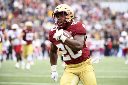 Oct 1, 2022; Chestnut Hill, Massachusetts, USA;  Boston College Eagles running back Alex Broome (20) runs the ball for a touchdown during the first half against the Louisville Cardinals at Alumni Stadium. Mandatory Credit: Bob DeChiara-USA TODAY Sports