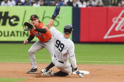 Oct 1, 2022; Bronx, New York, USA; New York Yankees right fielder Aaron Judge (99) is forced our at second base by Baltimore Orioles third baseman Gunnar Henderson (2) in the first inning at Yankee Stadium. Mandatory Credit: Wendell Cruz-USA TODAY Sports