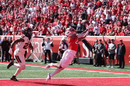 Oct 1, 2022; Salt Lake City, Utah, USA; Utah Utes wide receiver Jaylen Dixon (25) catches a touchdown pass against Oregon State Beavers linebacker Cade Brownholtz (29) in the first quarter at Rice-Eccles Stadium. Mandatory Credit: Rob Gray-USA TODAY Sports