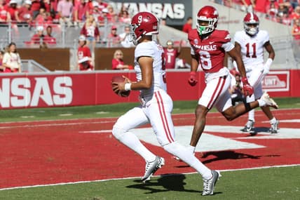 Oct 1, 2022; Fayetteville, Arkansas, USA; Alabama Crimson Tide quarterback Bryce Young (9) rushes for a touchdown in the first quarter against the Arkansas Razorbacks at Donald W. Reynolds Razorback Stadium. Mandatory Credit: Nelson Chenault-USA TODAY Sports