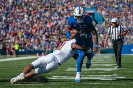 Oct 1, 2022; Lawrence, Kansas, USA; Kansas Jayhawks quarterback Jalon Daniels (6) heads towards the end zone during the second quarter against the Iowa State Cyclones at David Booth Kansas Memorial Stadium. Mandatory Credit: William Purnell-USA TODAY Sports