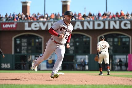 Oct 1, 2022; San Francisco, California, USA; Arizona Diamondbacks first baseman Christian Walker (53) runs to third base on a single hit by second baseman Josh Rojas (10) (not pictured) against the San Francisco Giants during the seventh inning at Oracle Park. Mandatory Credit: Robert Edwards-USA TODAY Sports