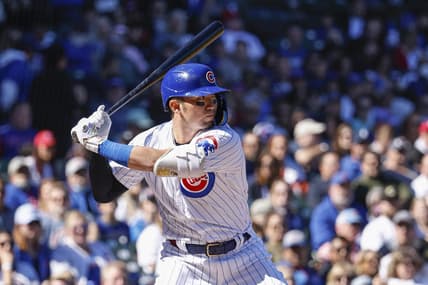 Oct 1, 2022; Chicago, Illinois, USA; Chicago Cubs right fielder Seiya Suzuki (27) bats against the Cincinnati Reds during the first inning at Wrigley Field. Mandatory Credit: Kamil Krzaczynski-USA TODAY Sports