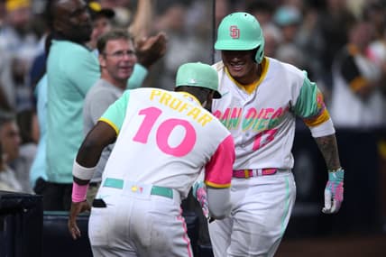 Oct 1, 2022; San Diego, California, USA; San Diego Padres third baseman Manny Machado (13) is congratulated by left fielder Jurickson Profar (10) after hitting a home run against the Chicago White Sox during the seventh inning at Petco Park. Mandatory Credit: Orlando Ramirez-USA TODAY Sports