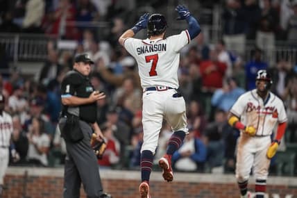 Oct 1, 2022; Cumberland, Georgia, USA; Atlanta Braves shortstop Dansby Swanson (7) reacts after hitting a home run against the New York Mets during the fifth inning at Truist Park. Mandatory Credit: Dale Zanine-USA TODAY Sports