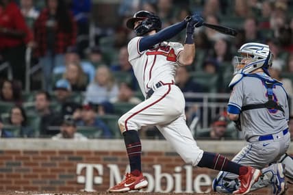 Oct 1, 2022; Cumberland, Georgia, USA; Atlanta Braves shortstop Dansby Swanson (7) hits a home run against the New York Mets during the fifth inning at Truist Park. Mandatory Credit: Dale Zanine-USA TODAY Sports