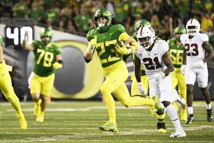 Oct 1, 2022; Eugene, Oregon, USA; Oregon Ducks wide receiver Chase Cota (23) catches a pass for a touchdown during the first half against the Stanford Cardinal at Autzen Stadium. Mandatory Credit: Troy Wayrynen-USA TODAY Sports