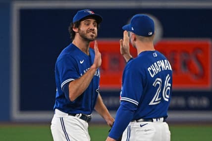 Oct 2, 2022; Toronto, Ontario, CAN; Toronto Blue Jays pitcher Jordan Romano (68) and third base Matt Chapman (26) celebrate the win against the Boston Red Sox at Rogers Centre. Mandatory Credit: Gerry Angus-USA TODAY Sports