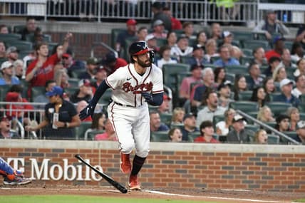 Oct 2, 2022; Cumberland, Georgia, USA; Atlanta Braves starting shortstop Dansby Swanson (7) hits a home run against the New York Mets in the first inning at Truist Park. Mandatory Credit: Larry Robinson-USA TODAY Sports