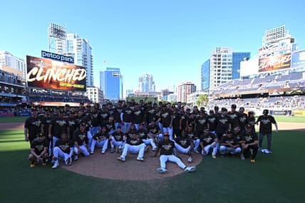 Oct 2, 2022; San Diego, California, USA; San Diego Padres players, coaches and staff pose for a photograph following the game against the Chicago White Sox after clinching a playoff berth at Petco Park. Mandatory Credit: Orlando Ramirez-USA TODAY Sports