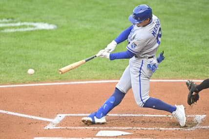 Oct 3, 2022; Cleveland, Ohio, USA; Kansas City Royals second baseman Michael Massey (19) singles in the second inning against the Cleveland Guardians at Progressive Field. Mandatory Credit: David Richard-USA TODAY Sports