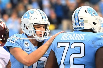 Oct 1, 2022; Chapel Hill, North Carolina, USA; North Carolina Tar Heels quarterback Drake Maye (10) with offensive lineman Asim Richards (72) in the third quarter at Kenan Memorial Stadium. Mandatory Credit: Bob Donnan-USA TODAY Sports