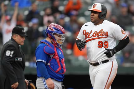 Oct 5, 2022; Baltimore, Maryland, USA; Baltimore Orioles first baseman Jesus Aguilar (99) scores to tie the game in the sixth inning against the Toronto Blue Jays at Oriole Park at Camden Yards. Mandatory Credit: Mitch Stringer-USA TODAY Sports
