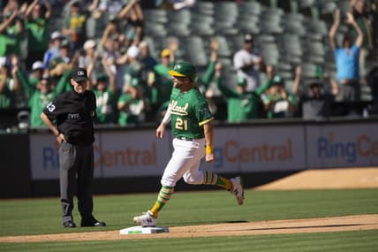 Oct 5, 2022; Oakland, California, USA; Oakland Athletics catcher Stephen Vogt (21) runs out his solo home run against the Los Angeles Angels during the seventh inning at RingCentral Coliseum. Umpire is Lance Barksdale. Mandatory Credit: D. Ross Cameron-USA TODAY Sports