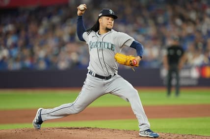 Oct 7, 2022; Toronto, Ontario, CAN; Seattle Mariners starting pitcher Luis Castillo (21) pitches in the first inning against the Toronto Blue Jays during game one of the Wild Card series for the 2022 MLB Playoffs at Rogers Centre. Mandatory Credit: Nick Turchiaro-USA TODAY Sports