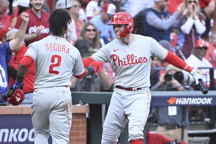 Oct 7, 2022; St. Louis, Missouri, USA; Philadelphia Phillies first baseman Rhys Hoskins (17) congratulates second baseman Jean Segura (2) during the ninth inning against the St. Louis Cardinals during game one of the Wild Card series for the 2022 MLB Playoffs at Busch Stadium. Mandatory Credit: Jeff Curry-USA TODAY Sports