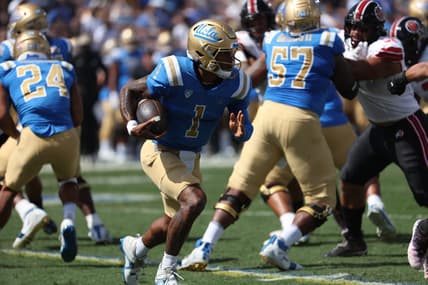 Oct 8, 2022; Pasadena, California, USA;  UCLA Bruins quarterback Dorian Thompson-Robinson (1) runs with a ball during the first quarter against the Utah Utes at Rose Bowl. Mandatory Credit: Kiyoshi Mio-USA TODAY Sports