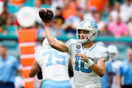 Oct 8, 2022; Miami Gardens, Florida, USA; North Carolina Tar Heels quarterback Drake Maye (10) throws a pass against the Miami Hurricanes during the first quarter at Hard Rock Stadium. Mandatory Credit: Rich Storry-USA TODAY Sports