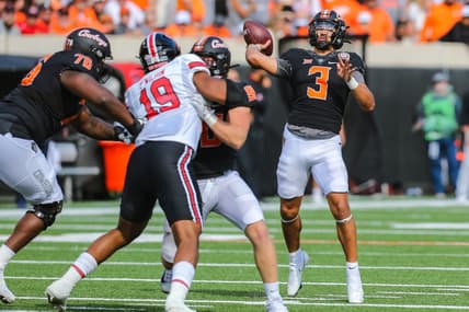 Oklahoma State's Spencer Sanders (3) throws the ball in the first quarter during a college football game between the Oklahoma State Cowboys and the Texas Tech Red Raiders at Boone Pickens Stadium in Stillwater, Okla., Saturday, Oct. 8, 2022.

Osu Vs Texas Tech