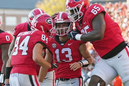 Georgia Bulldogs quarterback Stetson Bennett (13) celebrates his touchdown run as Georgia takes on Auburn at Sanford Stadium in Athens, Ga. on Saturday, Oct. 8th, 2022.

Sports Richard Hamm