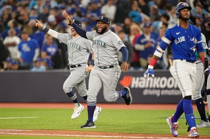 Oct 8, 2022; Toronto, Ontario, CAN; Seattle Mariners relief pitcher Diego Castillo (63) celebrates after the game against the Toronto Blue Jays in game two of the Wild Card series for the 2022 MLB Playoffs at Rogers Centre. Mandatory Credit: John E. Sokolowski-USA TODAY Sports