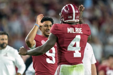 Oct 8, 2022; Tuscaloosa, Alabama, USA; Alabama Crimson Tide quarterback Jalen Milroe (4) celebrates with quarterback Bryce Young (9) after scoring a touchdown against the Texas A&M Aggies during the first half at Bryant-Denny Stadium. Mandatory Credit: Marvin Gentry-USA TODAY Sports