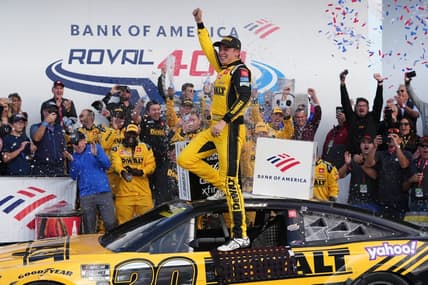 Oct 9, 2022; Concord, North Carolina, USA; NASCAR Cup Series driver Christopher Bell (20) celebrates after winning the Bank of America ROVAL 400 at Charlotte Motor Speedway Road Course. Mandatory Credit: Jasen Vinlove-USA TODAY Sports