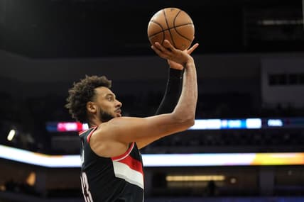 Oct 9, 2022; Sacramento, California, USA; Portland Trail Blazers center Olivier Sarr (33) shoots a 3-point basket against the Sacramento Kings during the second quarter at Golden 1 Center. Mandatory Credit: Darren Yamashita-USA TODAY Sports