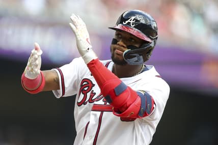 Oct 11, 2022; Atlanta, Georgia, USA; Atlanta Braves right fielder Ronald Acuna Jr. (13) reacts at first base after he singles against the Philadelphia Phillies in the fourth inning during game one of the NLDS for the 2022 MLB Playoffs at Truist Park. Mandatory Credit: Brett Davis-USA TODAY Sports