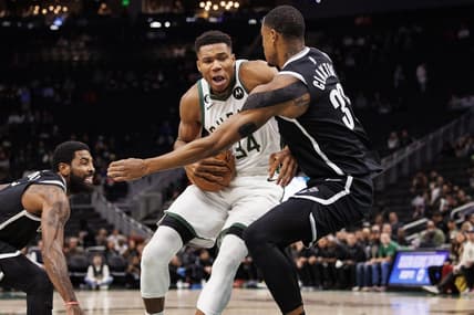 Oct 12, 2022; Milwaukee, Wisconsin, USA;  Milwaukee Bucks forward Giannis Antetokounmpo (34) drives for the basket against Brooklyn Nets forward Nic Claxton (33) during the first quarter at Fiserv Forum. Mandatory Credit: Jeff Hanisch-USA TODAY Sports