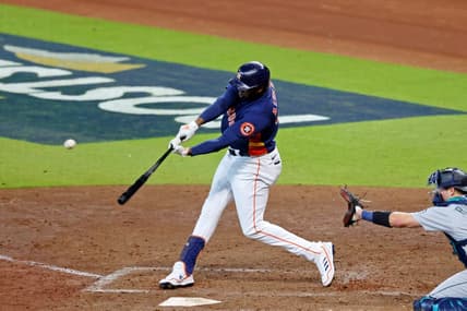 Oct 13, 2022; Houston, Texas, USA; Houston Astros left fielder Yordan Alvarez (44) hits a two-run home run against the Seattle Mariners during the sixth inning of game two of the ALDS for the 2022 MLB Playoffs at Minute Maid Park. Mandatory Credit: Thomas Shea-USA TODAY Sports