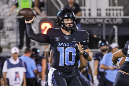 Oct 13, 2022; Orlando, Florida, USA; UCF Knights quarterback John Rhys Plumlee (10) throws a pass during the first quarter against the Temple Owls at FBC Mortgage Stadium. Mandatory Credit: Mike Watters-USA TODAY Sports