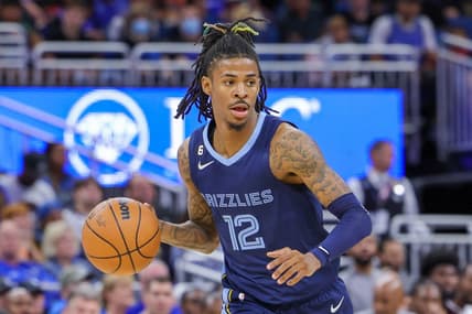 Oct 11, 2022; Orlando, Florida, USA; Memphis Grizzlies guard Ja Morant (12) brings the ball up court during the second half against the Memphis Grizzlies at Amway Center. Mandatory Credit: Mike Watters-USA TODAY Sports