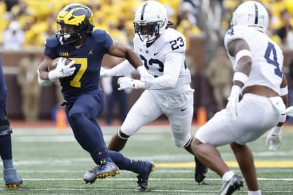 Oct 15, 2022; Ann Arbor, Michigan, USA;  Michigan Wolverines running back Donovan Edwards (7) rushes in the first half against the Penn State Nittany Lions at Michigan Stadium. Mandatory Credit: Rick Osentoski-USA TODAY Sports