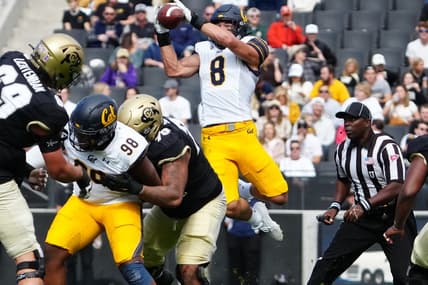 Oct 15, 2022; Boulder, Colorado, USA; California Golden Bears linebacker Jackson Sirmon (8) pulls in an interception in the first quarter against the Colorado Buffaloes at Folsom Field. Mandatory Credit: Ron Chenoy-USA TODAY Sports