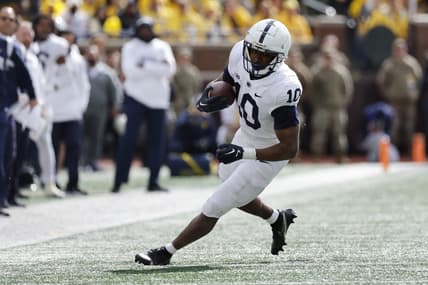Oct 15, 2022; Ann Arbor, Michigan, USA;  Penn State Nittany Lions running back Nicholas Singleton (10) rushes in the second half against the Michigan Wolverines at Michigan Stadium. Mandatory Credit: Rick Osentoski-USA TODAY Sports