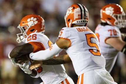 Clemson Tigers quarterback DJ Uiagalelei (5) the ball off to Clemson Tigers running back Phil Mafah (26). The Clemson Tigers defeated the Florida State Seminoles 34-28 at Doak Campbell Stadium on Saturday, Oct. 15, 2022.

Fsu V Clemson First651