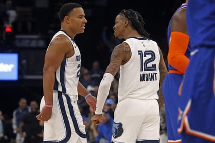 Oct 19, 2022; Memphis, Tennessee, USA; Memphis Grizzlies guard Desmond Bane (22) and guard Ja Morant (12) react after a basket during the second half against the New York Knicks at FedExForum. Mandatory Credit: Petre Thomas-USA TODAY Sports