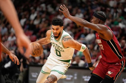 Oct 21, 2022; Miami, Florida, USA; Boston Celtics forward Jayson Tatum (0) dribbles the ball against the Miami Heat during the second quarter at FTX Arena. Mandatory Credit: Rich Storry-USA TODAY Sports