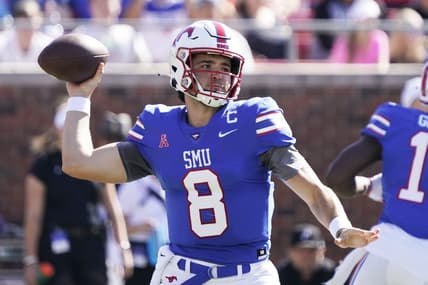 Oct 22, 2022; Dallas, Texas, USA; Southern Methodist Mustangs quarterback Tanner Mordecai (8) throws downfield during the first half against the Cincinnati Bearcats at Gerald J. Ford Stadium. Mandatory Credit: Raymond Carlin III-USA TODAY Sports