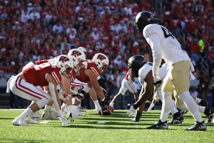 Oct 22, 2022; Madison, Wisconsin, USA;  The Wisconsin Badgers line up for a play during the first quarter against the Purdue Boilermakers at Camp Randall Stadium. Mandatory Credit: Jeff Hanisch-USA TODAY Sports