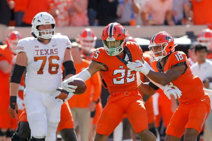 Oklahoma State Cowboys safety Jason Taylor II (25) celebrates after an interception beside safety Sean Michael Flanagan (18) as Texas Longhorns offensive lineman Hayden Conner (76) walks away during a college football game between the Oklahoma State Cowboys (OSU) and the University of Texas Longhorns at Boone Pickens Stadium in Stillwater, Okla., Saturday, Oct. 22, 2022.

Osu Vs Texas Football