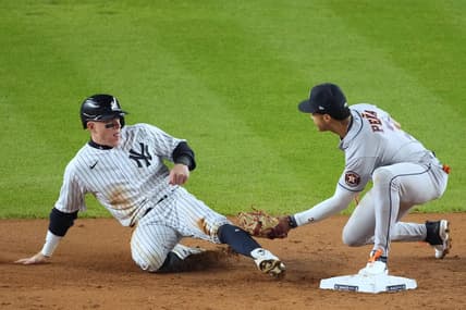 Oct 22, 2022; Bronx, New York, USA; New York Yankees center fielder Harrison Bader (22) is out at second by Houston Astros shortstop Jeremy Pena (3) after caught stealing in the fifth inning during game three of the ALCS for the 2022 MLB Playoffs at Yankee Stadium. Mandatory Credit: Robert Deutsch-USA TODAY Sports