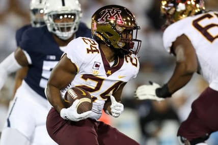 Oct 22, 2022; University Park, Pennsylvania, USA; Minnesota Golden Gophers running back Mohamed Ibrahim (24) runs with the ball during the first quarter against the Penn State Nittany Lions at Beaver Stadium. Mandatory Credit: Matthew OHaren-USA TODAY Sports