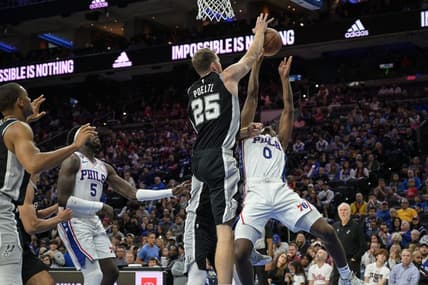 Oct 22, 2022; Philadelphia, Pennsylvania, USA; San Antonio Spurs center Jakob Poeltl (25) blocks a shot by Philadelphia 76ers guard Tyrese Maxey (0) during the fourth quarter at Wells Fargo Center. San Antonio won 114-105. Mandatory Credit: John Geliebter-USA TODAY Sports