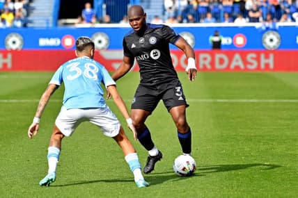 Oct 23, 2022; Montreal, Quebec, Canada; CF Montreal defender Kamal Miller (3) moves the ball against New York City midfielder Gabriel Pereira (38) during the conference semifinals for the Audi 2022 MLS Cup Playoffs at Stade Saputo. Mandatory Credit: Marc DesRosiers-USA TODAY Sports
